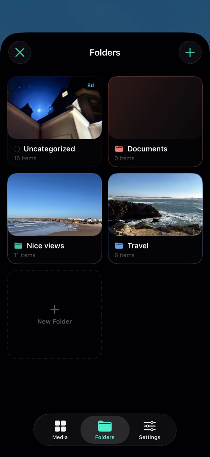 Folders screen showing folders in red, green and blue identity colours.